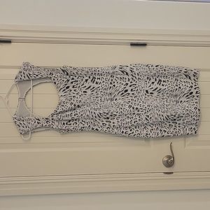 Selling because it's too small now.  Loved the dress though.